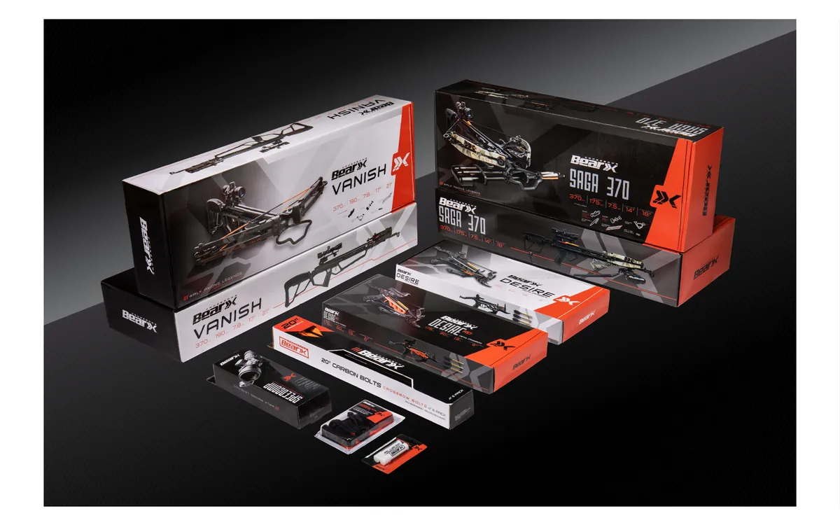 Bear X crossbow retail boxes arranged on a dark background